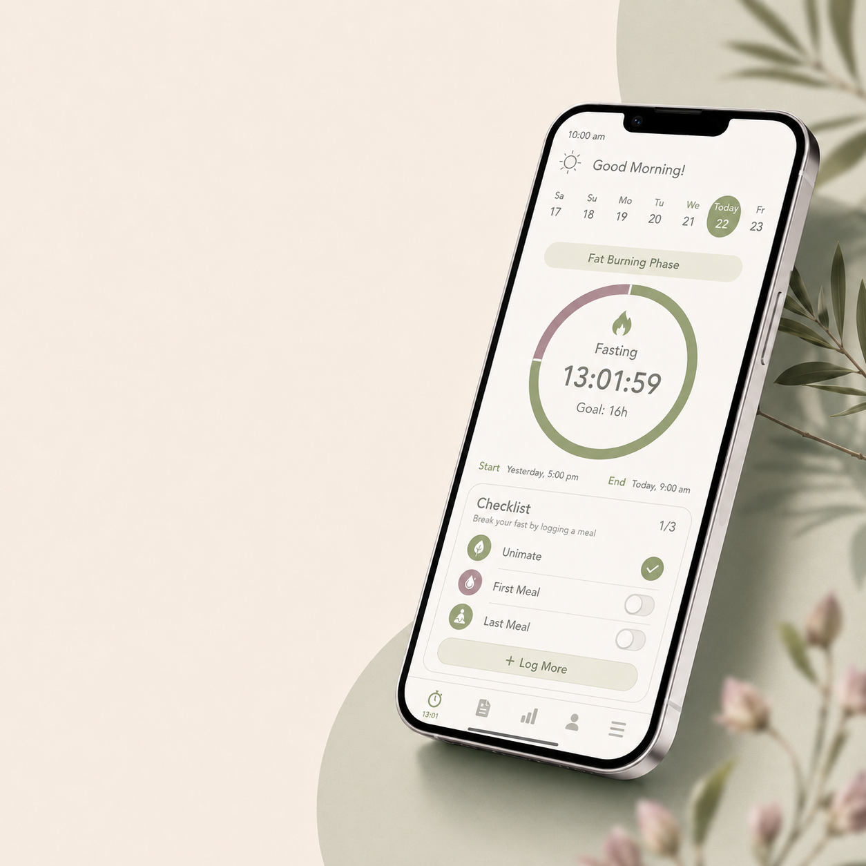A phone showing the fasting coach app resting against greenery